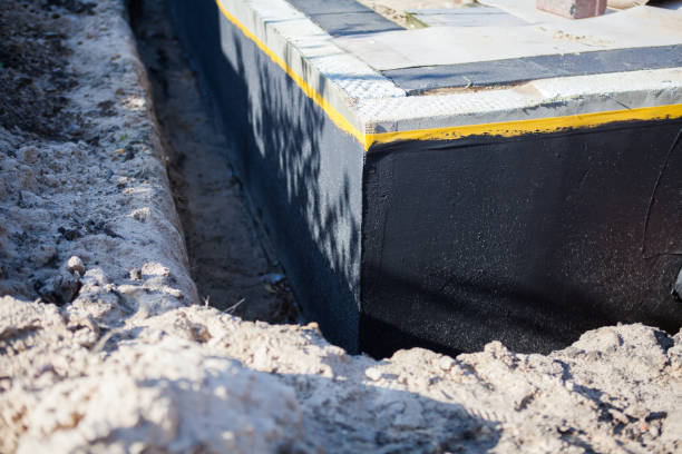 Professional Foundation Crack Repair technician working in Middleport, NY
